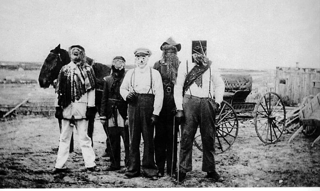 Mi-Carême Mi-carême troup in St. Joseph du Moine, Nova Scotia, in 1930. Photo from the Collection Centre de la Mi-Carême. (Wikimedia Commons)