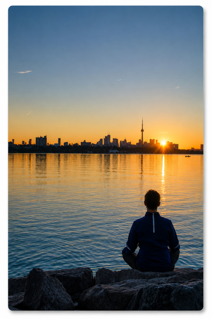 Person looking toward a city skyline at sunset representing property selection and neighbourhood choice