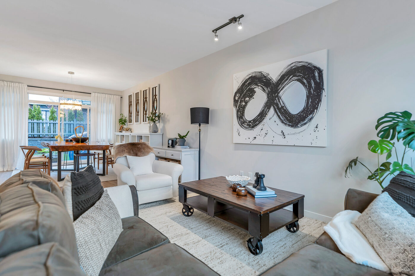 Staged living room at 138–1360 Mitchell Street in Ballantree North
