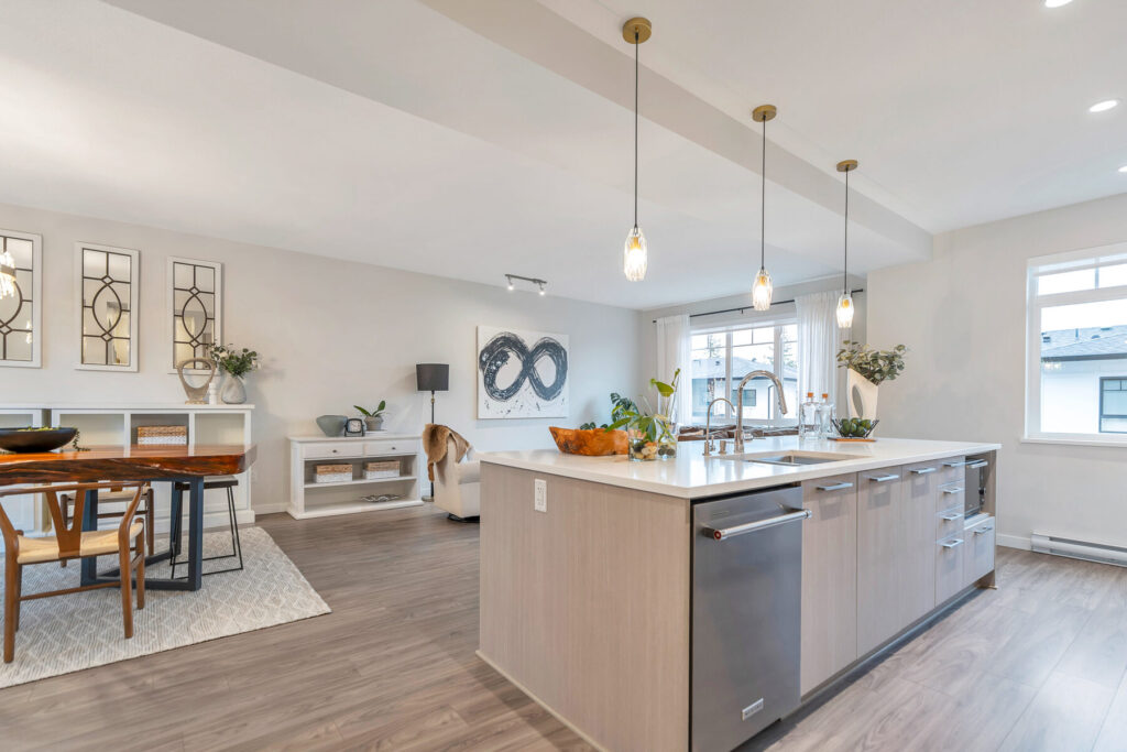 Staged kitchen and living area at 138-1360 Mitchell Street in Ballantree North by Polygon
